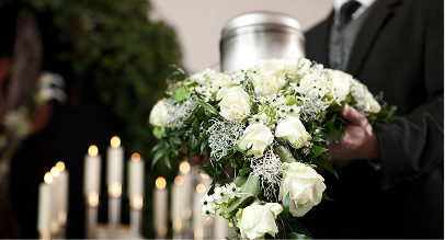 funeral director holding flowers