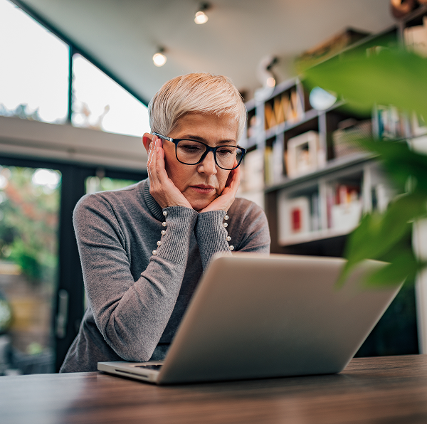woman looking at laptop