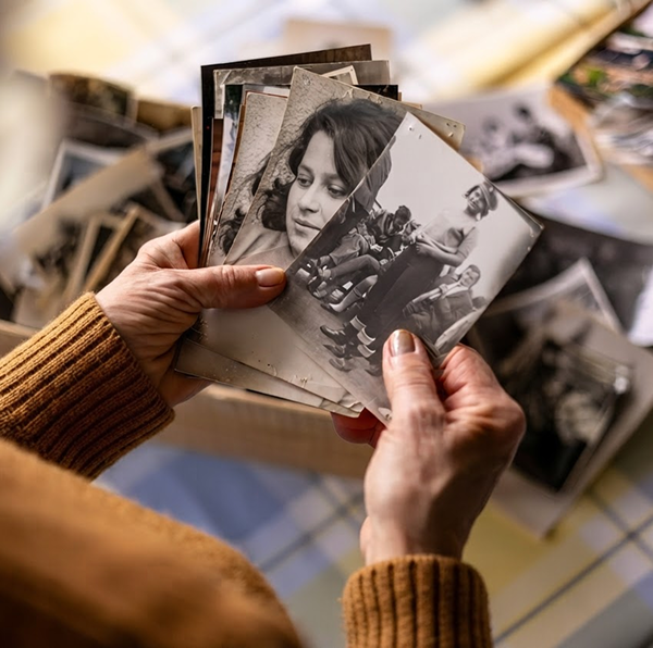 a person looking at photos